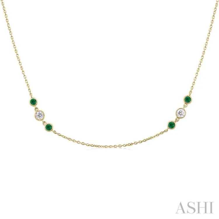 2.25 MM Emerald and 1/2 ctw Round Cut Diamond Precious Station Necklace in 14K Yellow Gold
