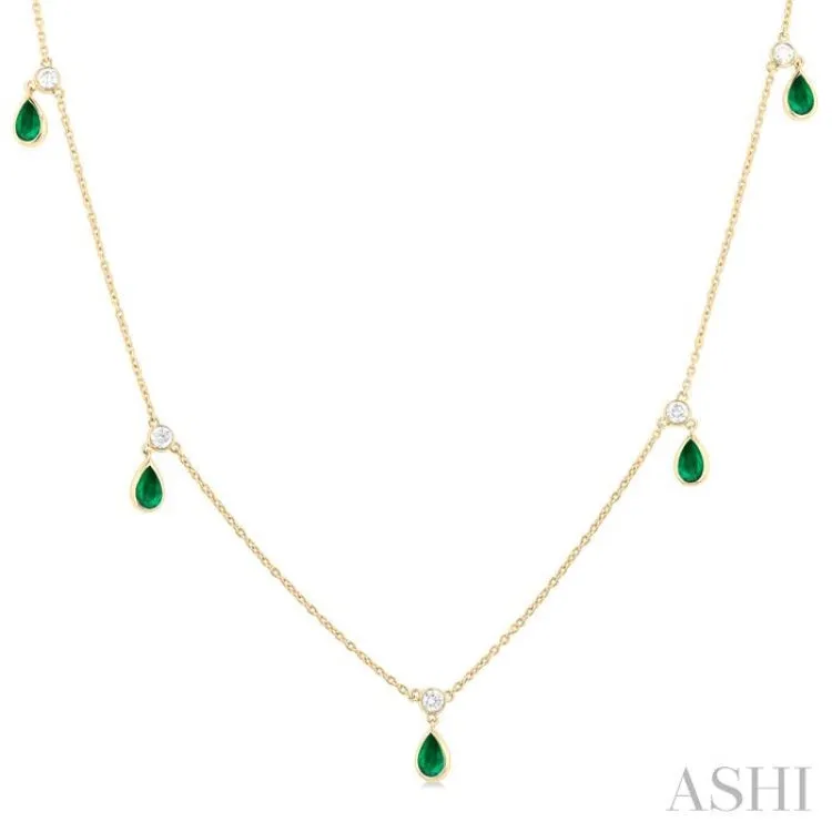 5x3 MM Pear Shape Emerald and 1/4 ctw Round Cut Diamonds Precious Station Necklace in 10K Yellow Gold