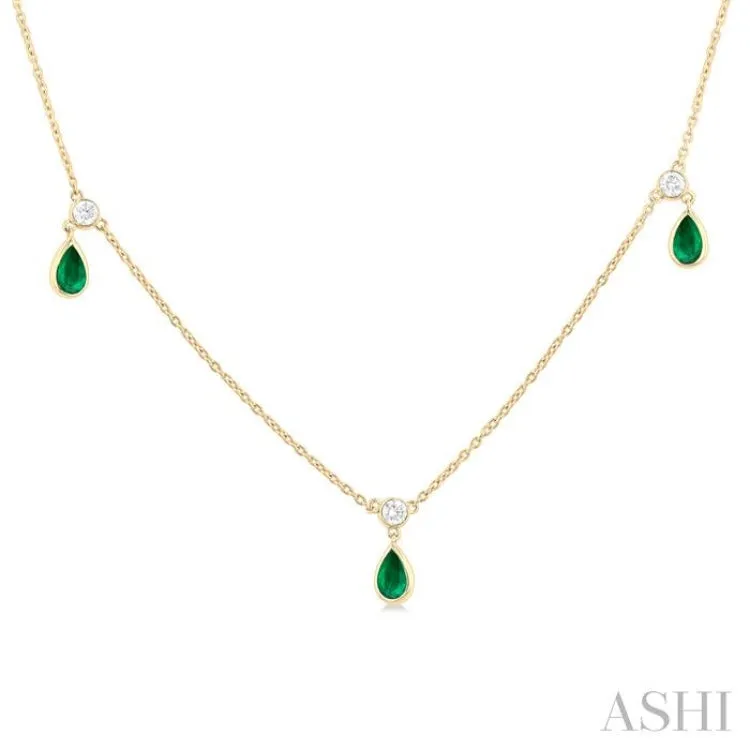 5x3 MM Pear Shape Emerald and 1/4 ctw Round Cut Diamonds Precious Station Necklace in 10K Yellow Gold