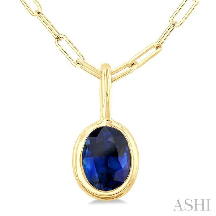 6x4 MM Bezel Set Oval Cut Sapphire Precious Fashion Pendant With Paperclip Chain in 10K Yellow Gold