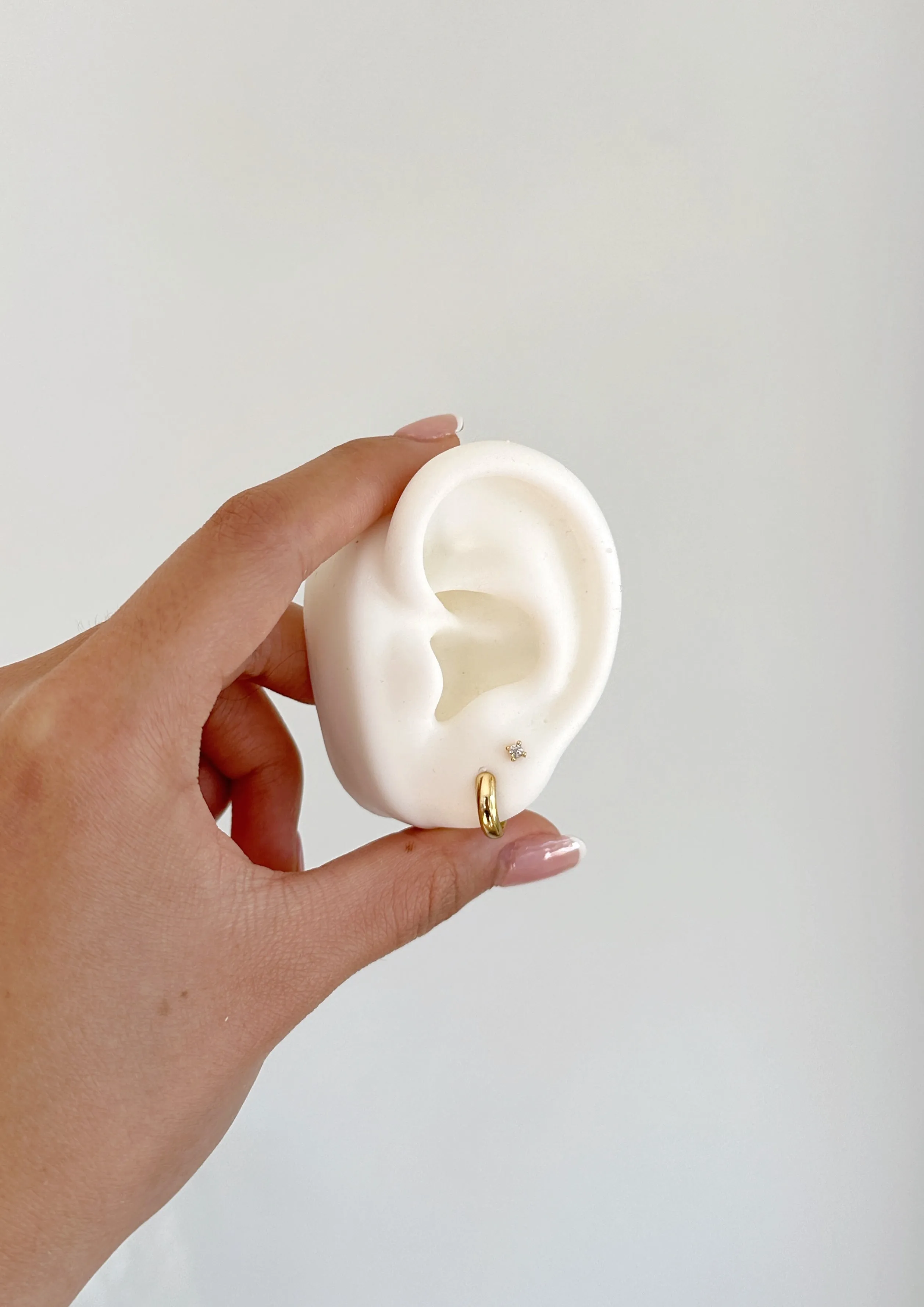 Bold huggie hoops