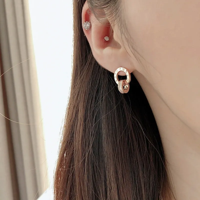 Elegant Titanium Steel Double-Wound Roman Numerals Crystal Stud Earrings by a Luxury Brand - Women's Exquisite Jewelry Accessories