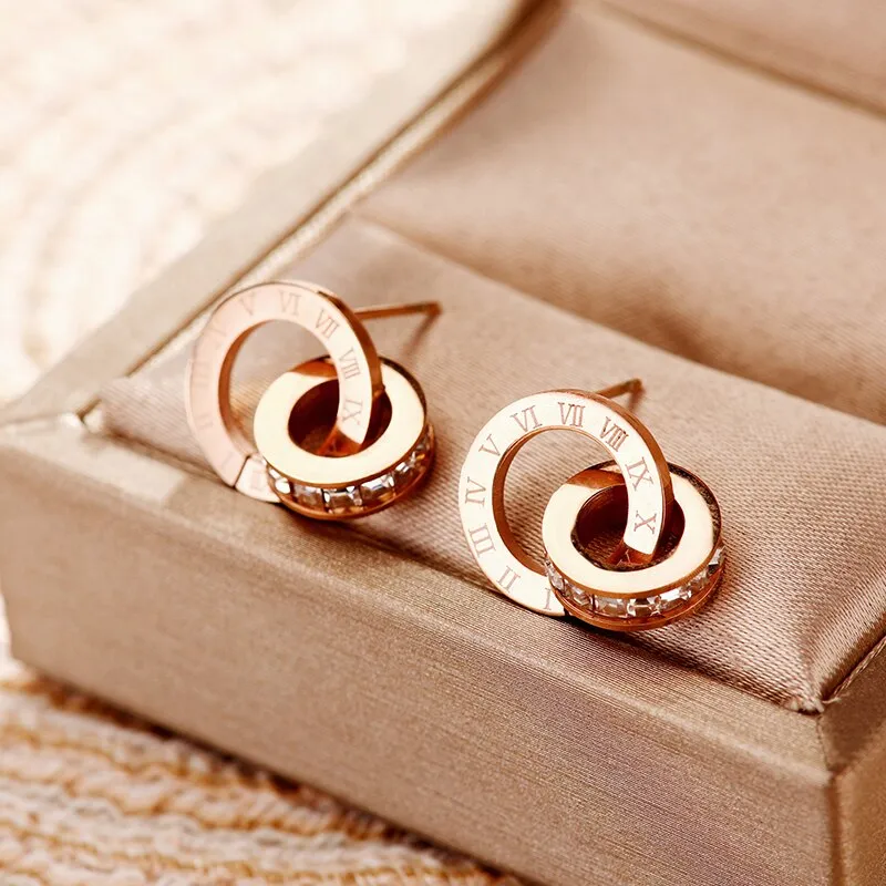 Elegant Titanium Steel Double-Wound Roman Numerals Crystal Stud Earrings by a Luxury Brand - Women's Exquisite Jewelry Accessories