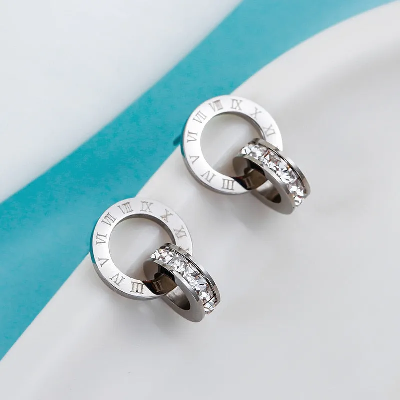 Elegant Titanium Steel Double-Wound Roman Numerals Crystal Stud Earrings by a Luxury Brand - Women's Exquisite Jewelry Accessories