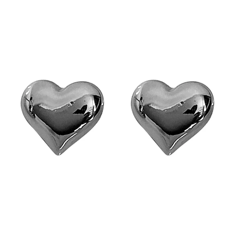 HeartGlow | Bold Heart Earrings for Chic Elegance