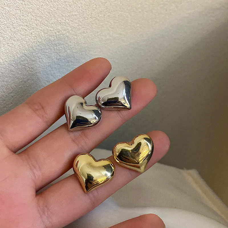 HeartGlow | Bold Heart Earrings for Chic Elegance
