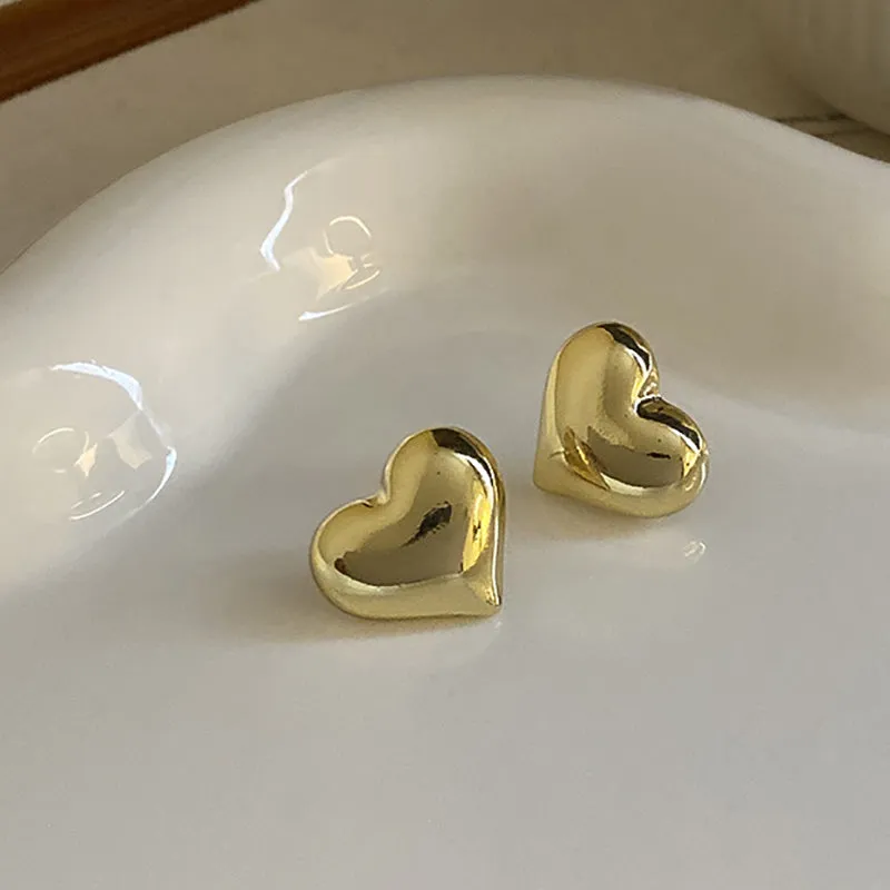 HeartGlow | Bold Heart Earrings for Chic Elegance