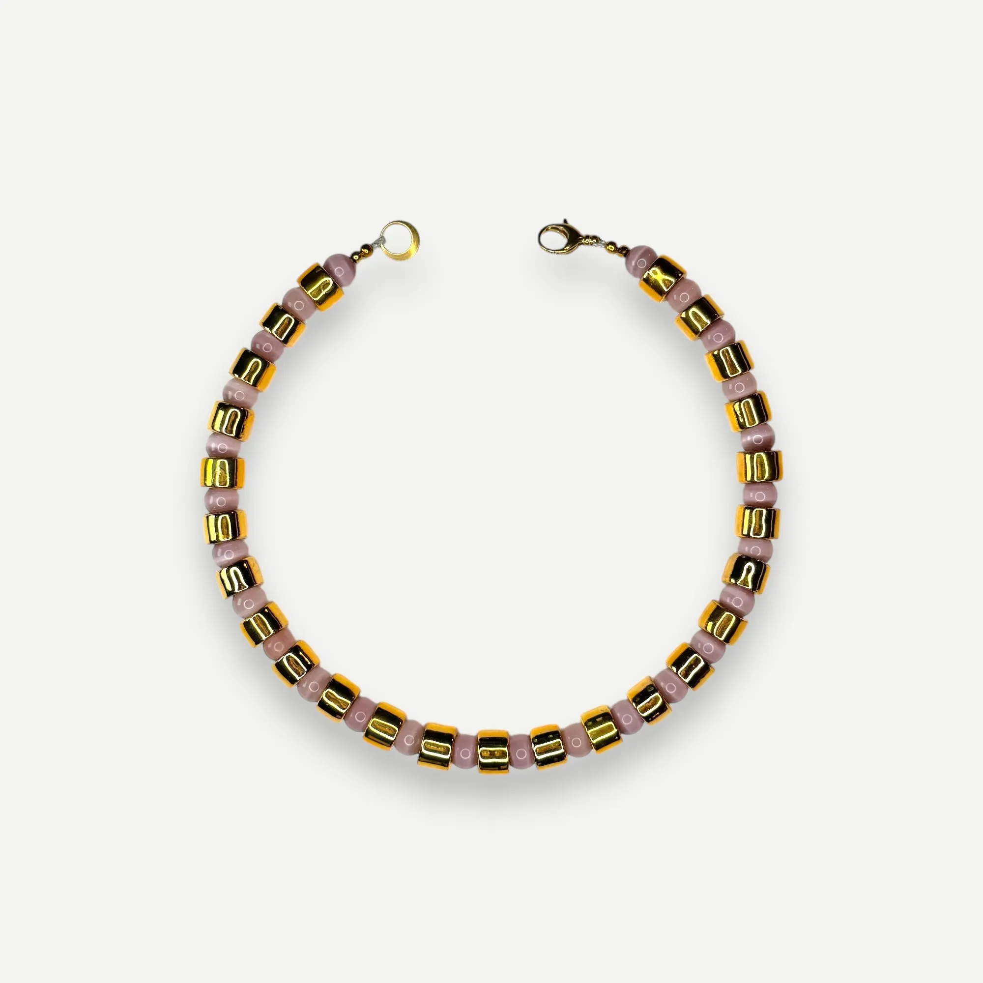 KARAT & CAT EYE SUNDRY.  BEAD ONE.