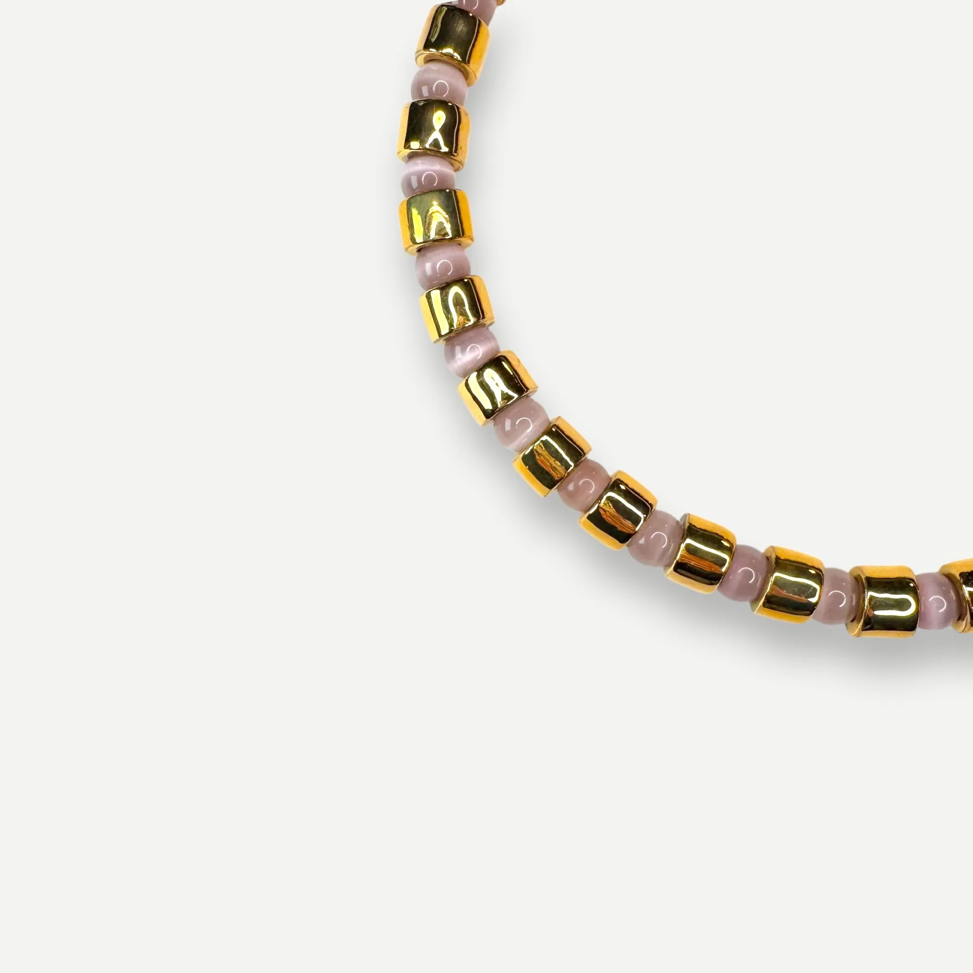 KARAT & CAT EYE SUNDRY.  BEAD ONE.