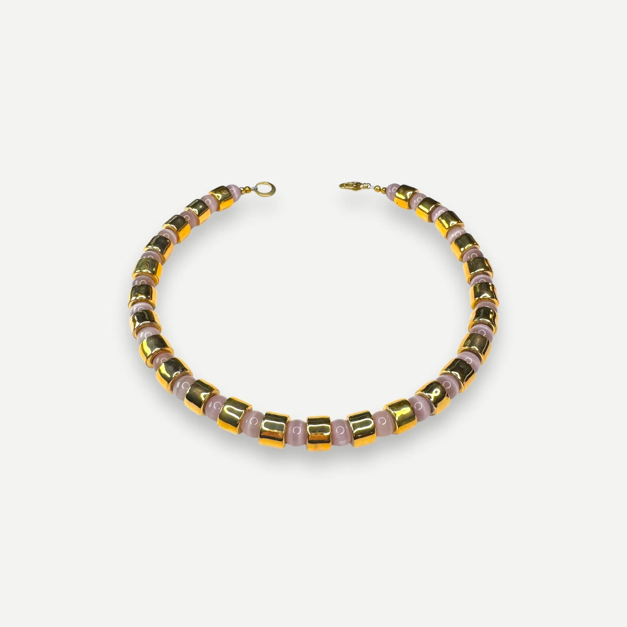 KARAT & CAT EYE SUNDRY.  BEAD ONE.