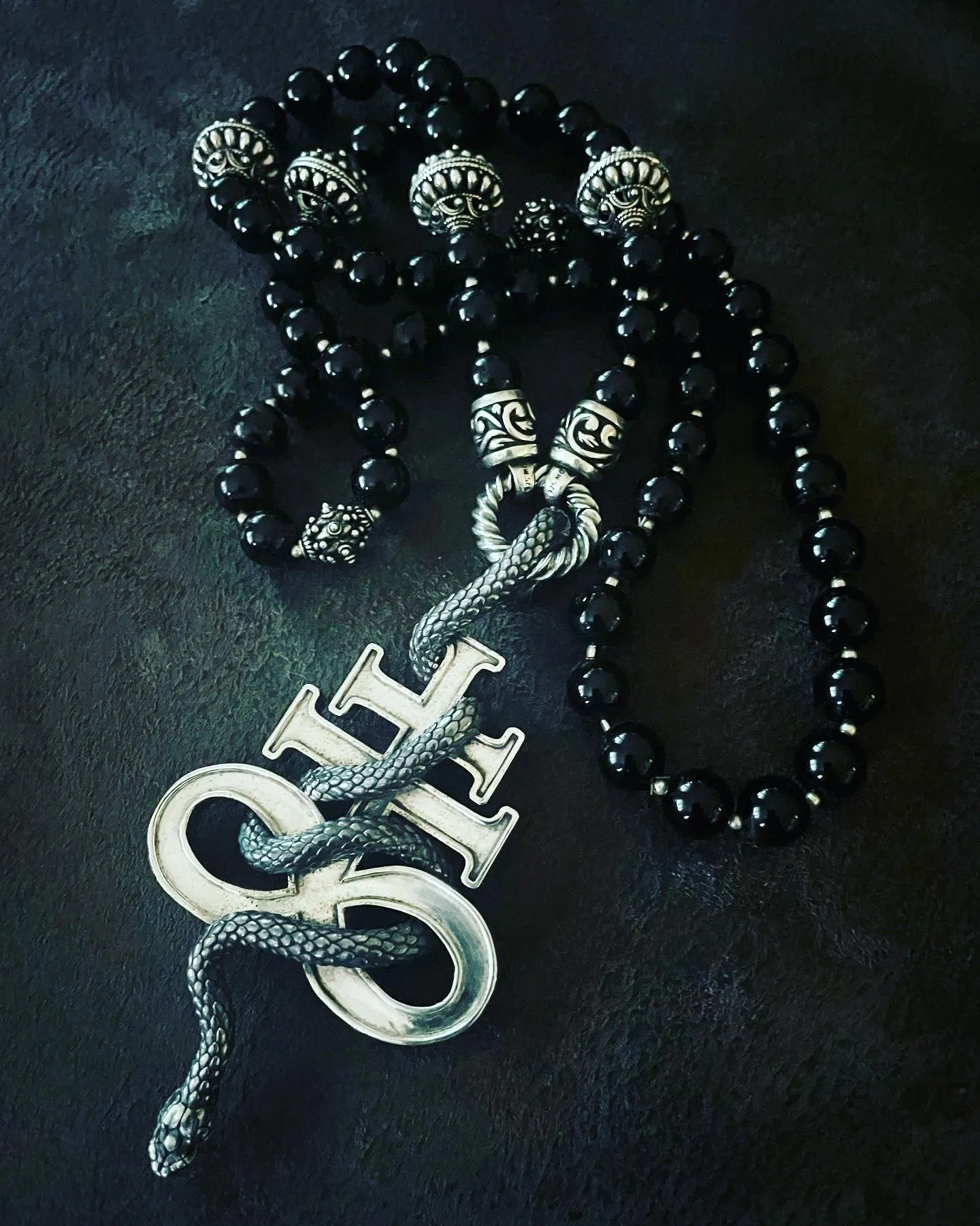 Leviathan Cross Snake Pendant