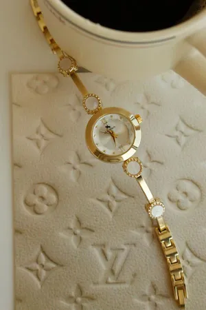<tc>Montre bracelet pour femme Myla Gold en métal</tc>