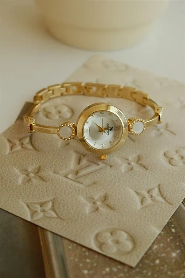 <tc>Montre bracelet pour femme Myla Gold en métal</tc>
