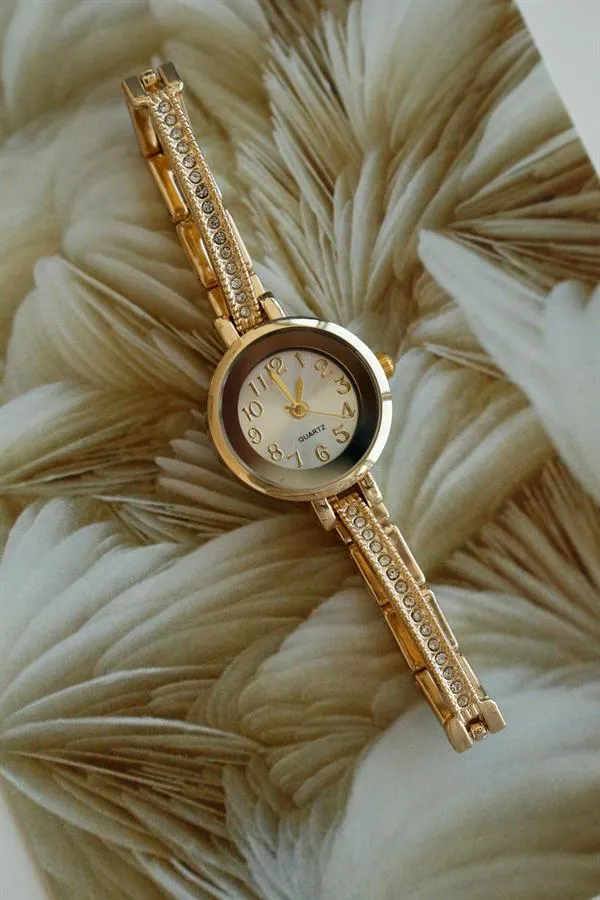<tc>Montre bracelet pour femme Sacco Gold en métal</tc>
