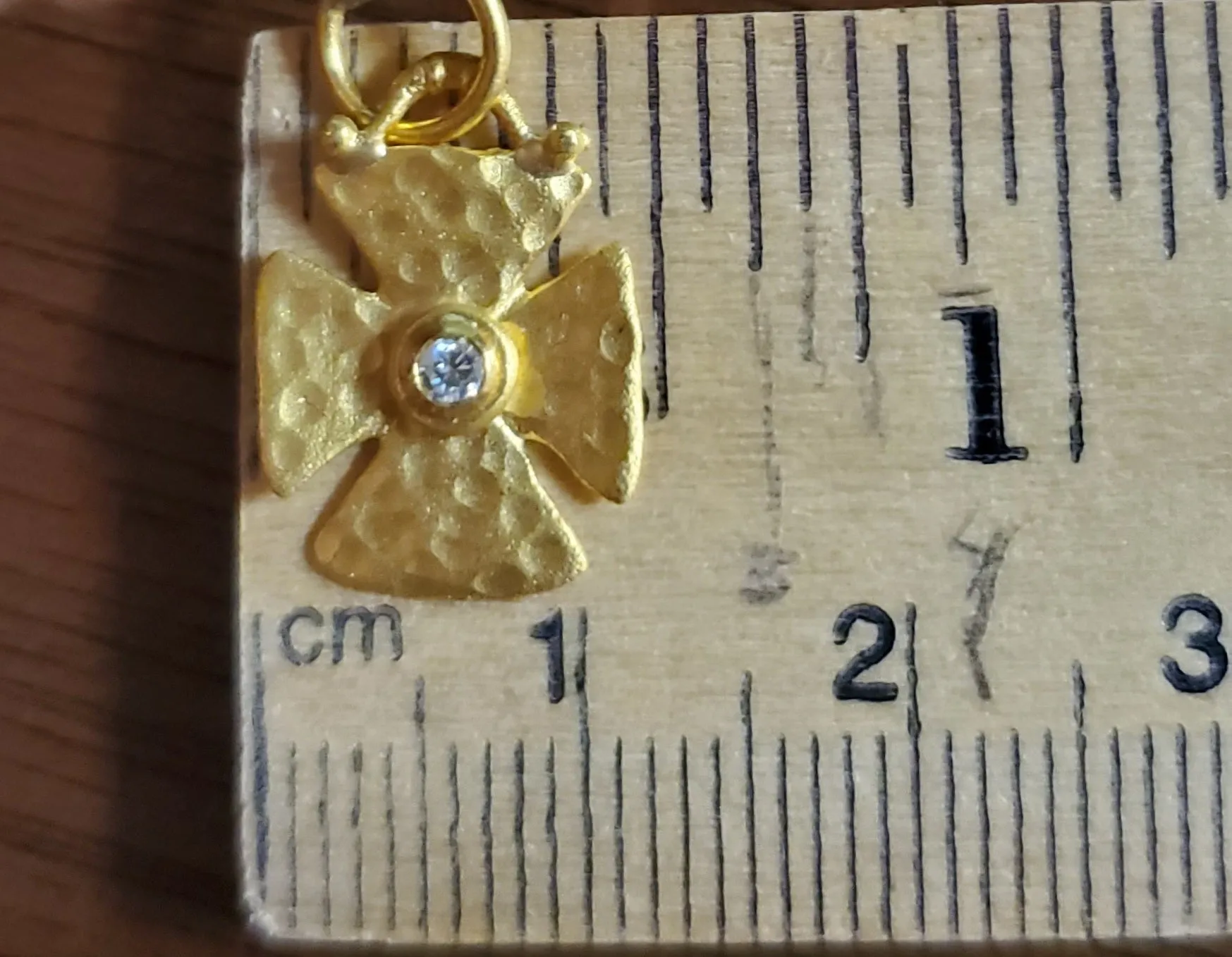 Prehistoric Works 24K  Gold Maltese Cross with a Diamond set in 24K Gold