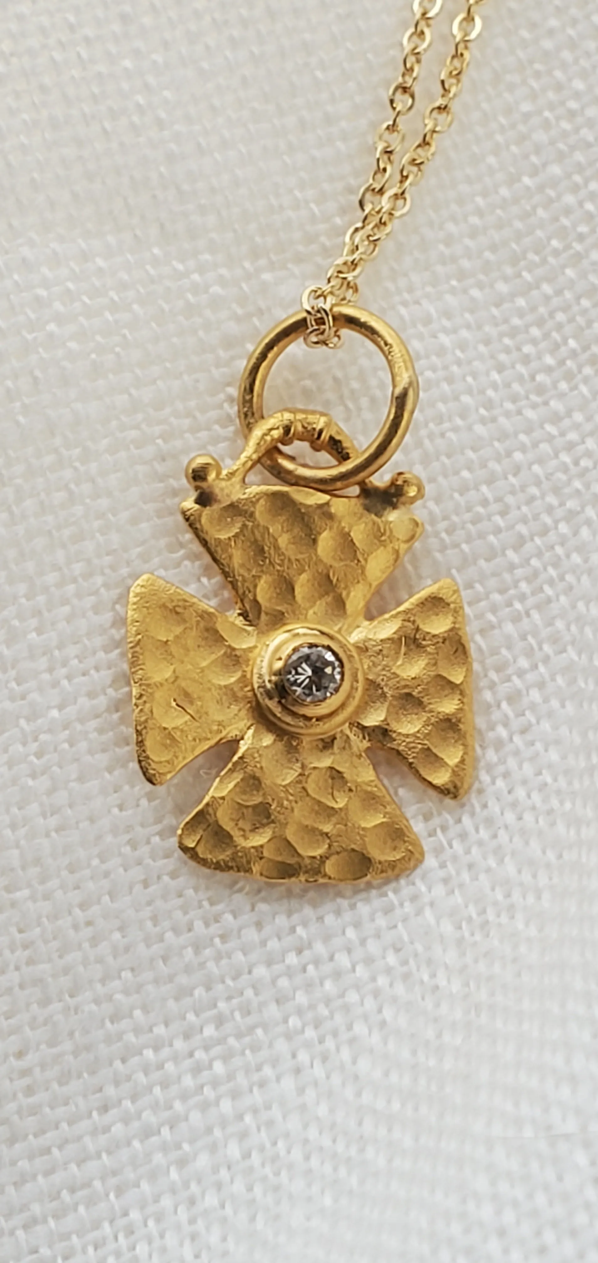 Prehistoric Works 24K  Gold Maltese Cross with a Diamond set in 24K Gold