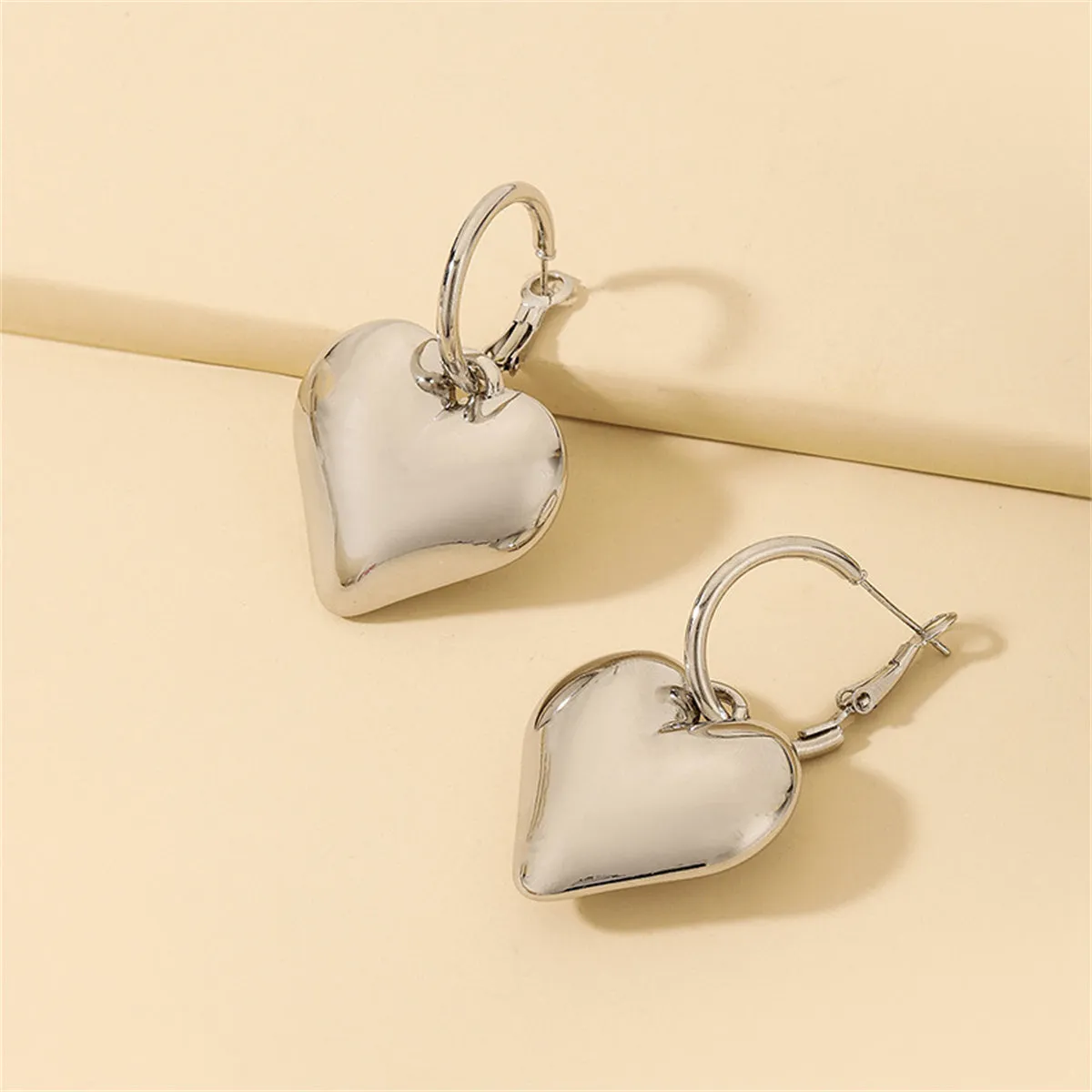 Silver-Plated Heart Huggie Earrings