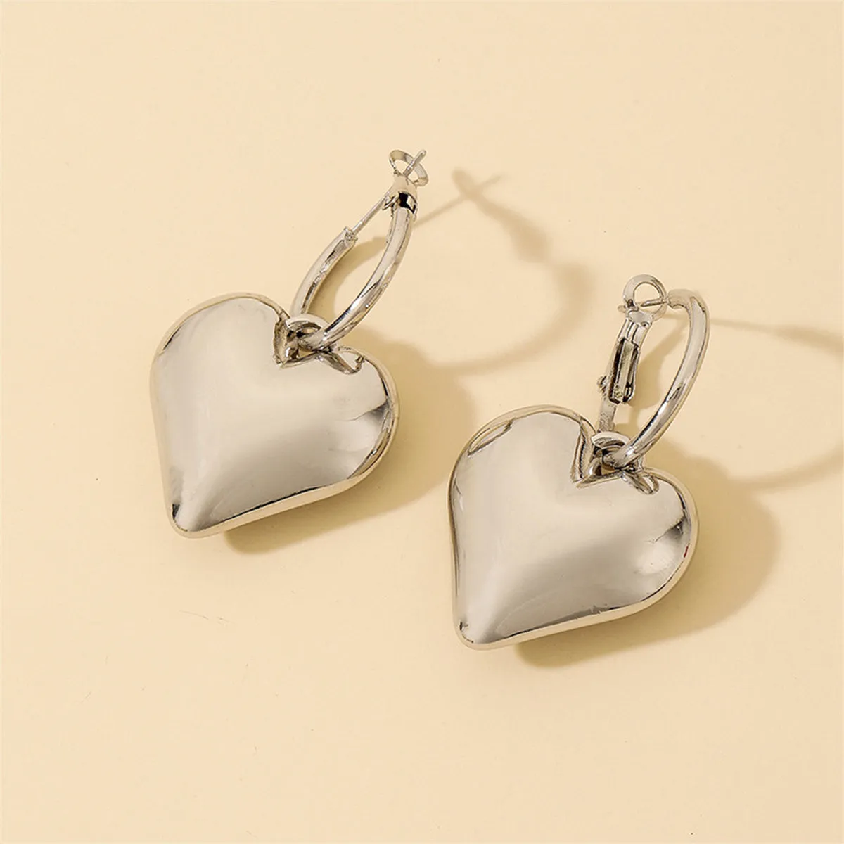 Silver-Plated Heart Huggie Earrings