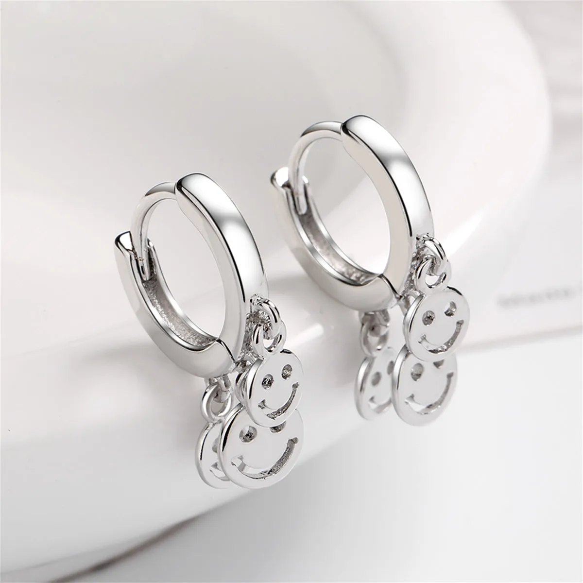 Silver-Plated Smiley Tassel Huggie Earrings