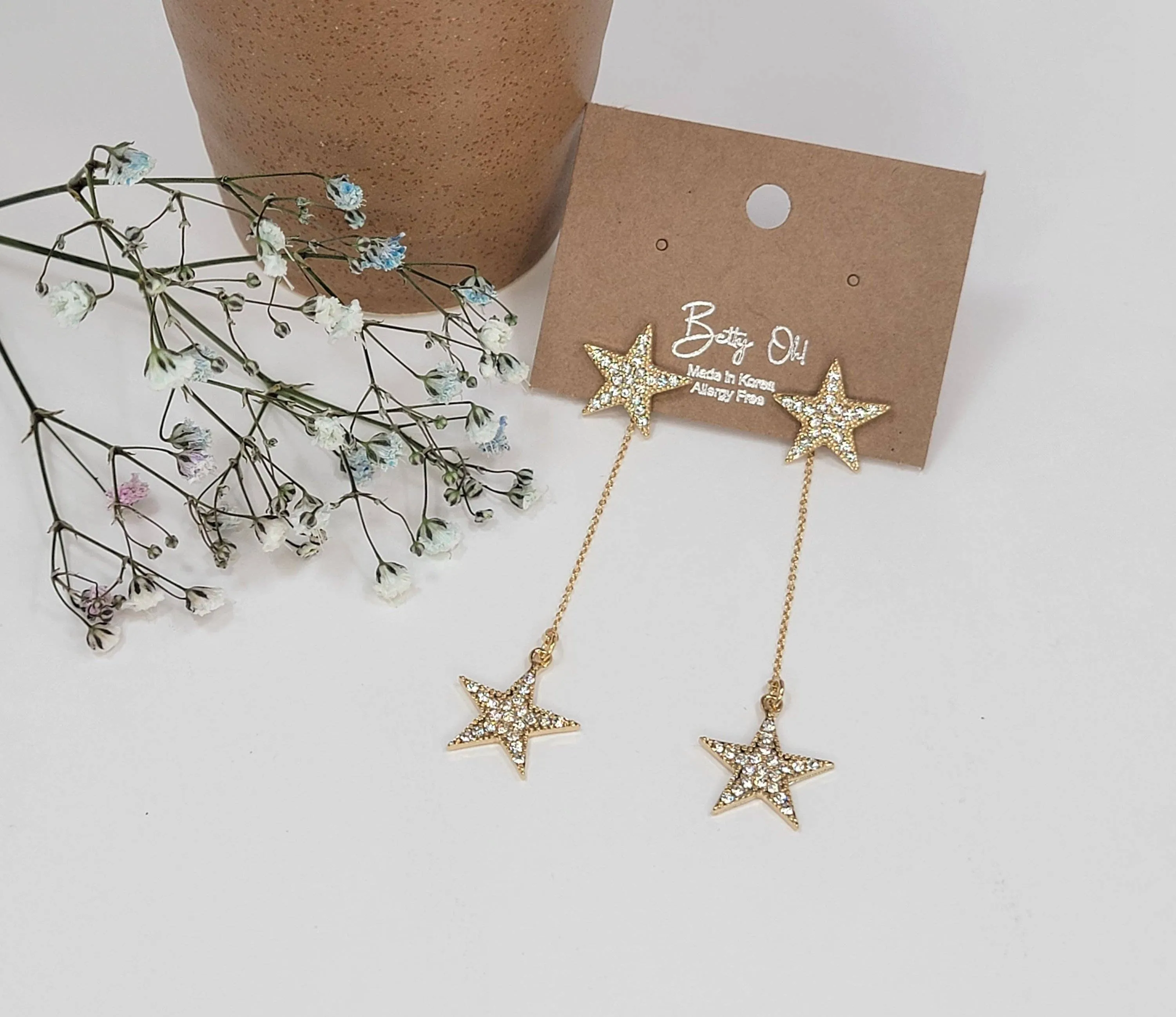 Star Dangle Earrings in Silver