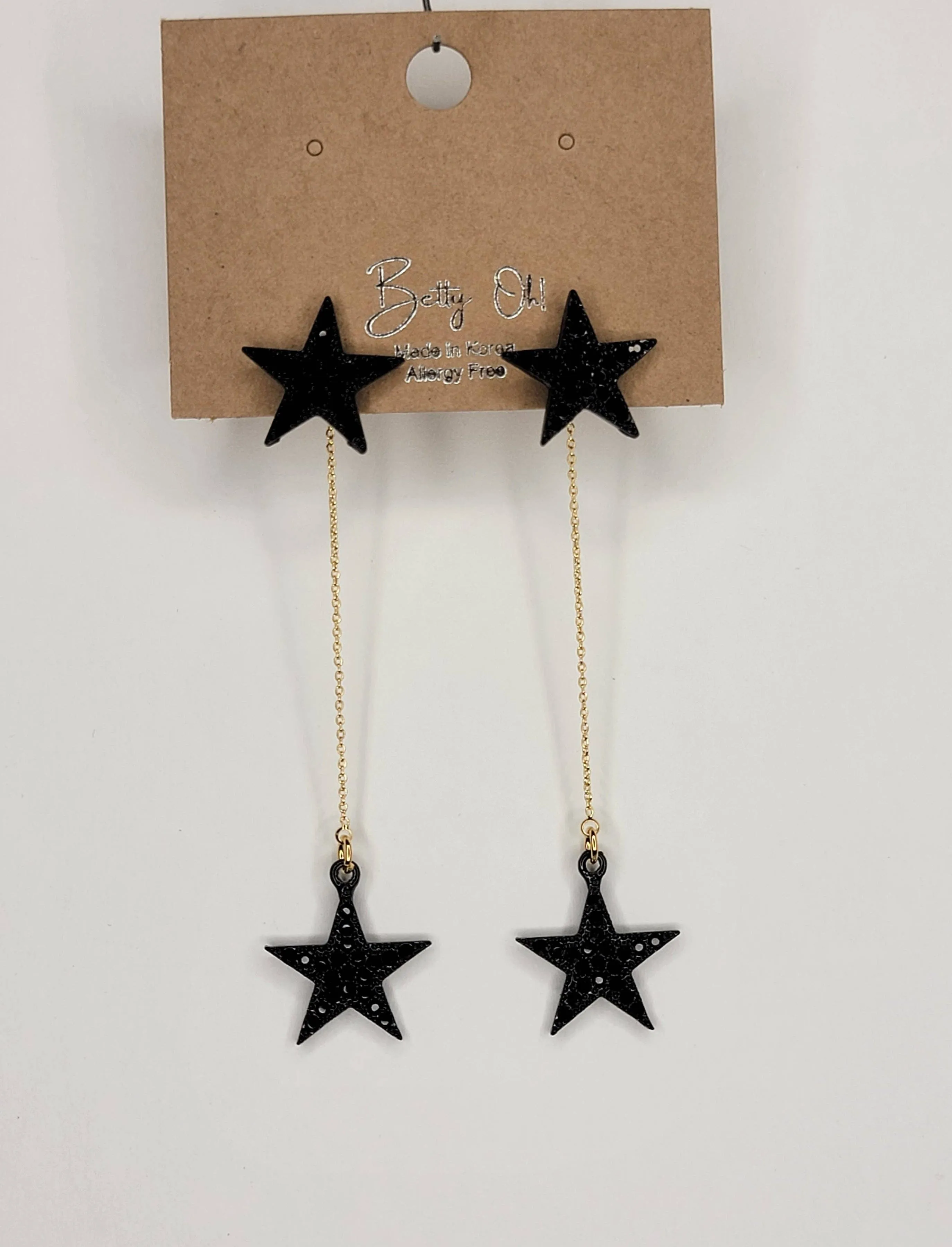 Star Dangle Earrings in Silver