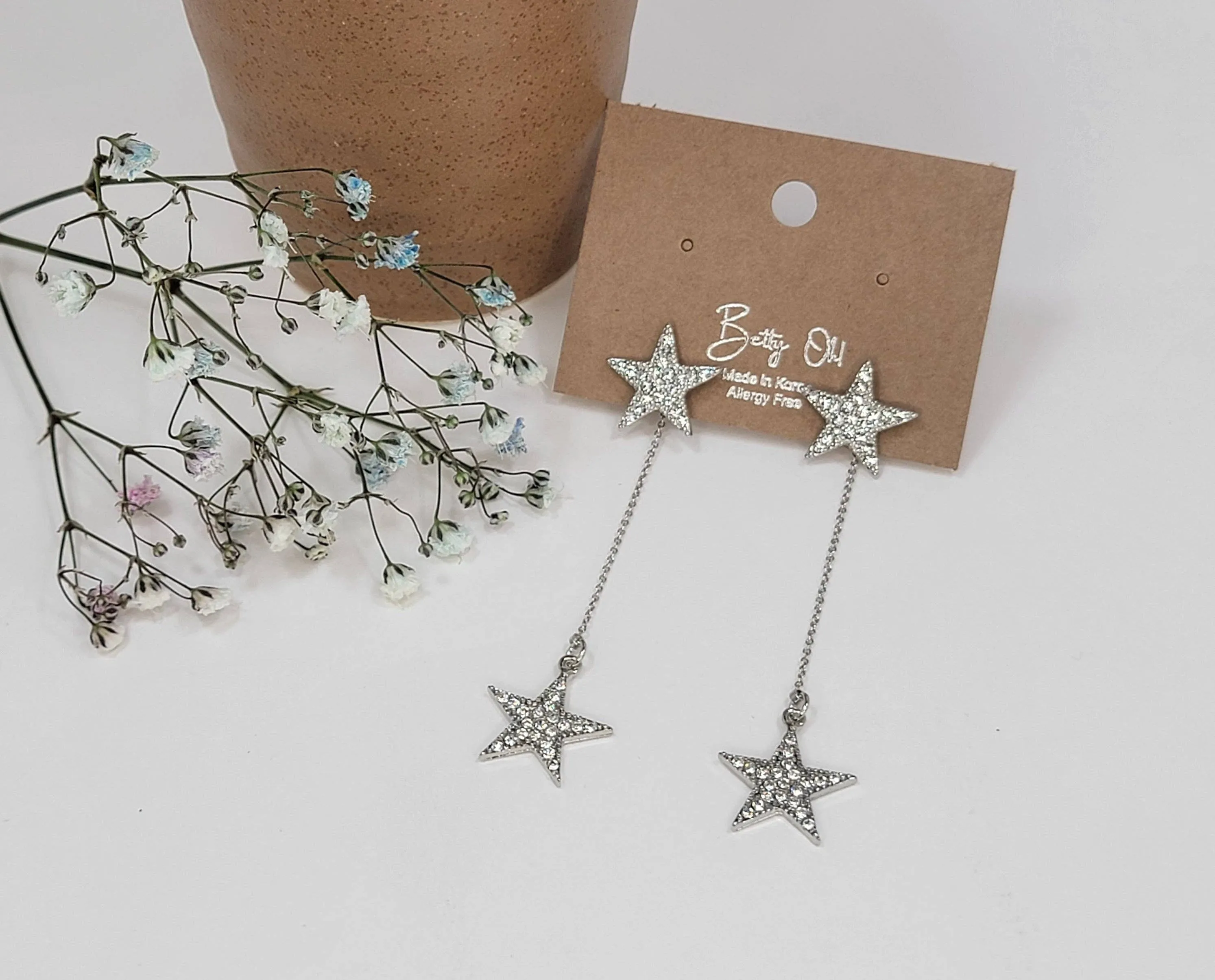 Star Dangle Earrings in Silver